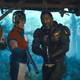 Some of The Suicide Squad's "shitty supervillains," including Idris Elba's Bloodsport, look aghast at something.